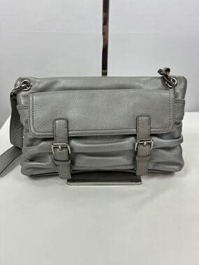 Cole Haan Crossbody Bag Silver Leather Buckles Outside Pocket Zipper Closure
